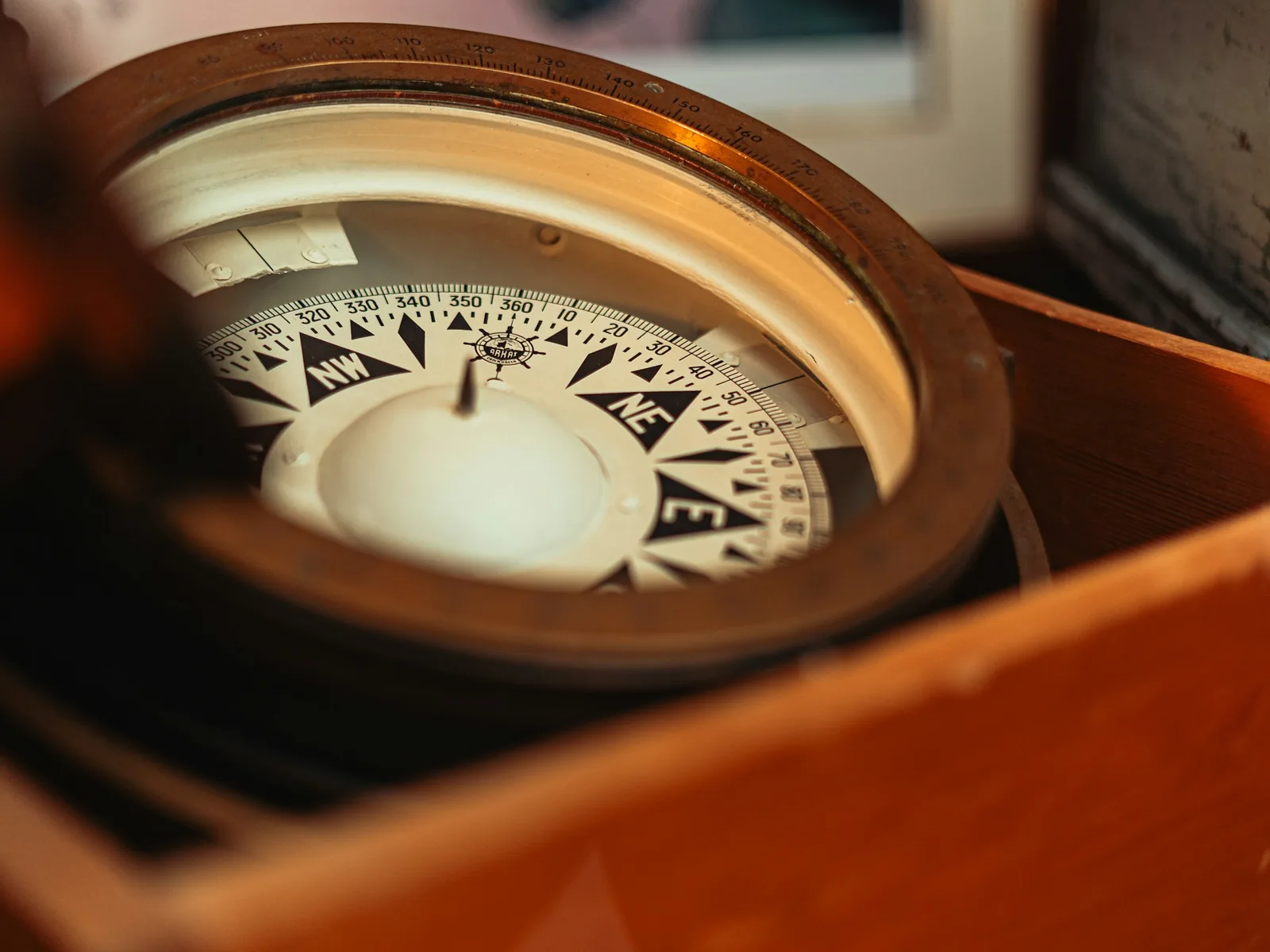 Classic ship's compass in its wooden housing
