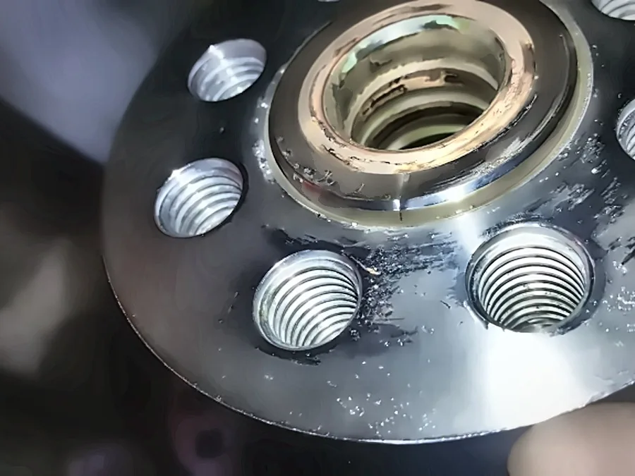 Hammelmann pump part inspected for wear during an overhaul